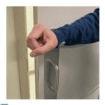 Use your arm to open the door instead of touching it